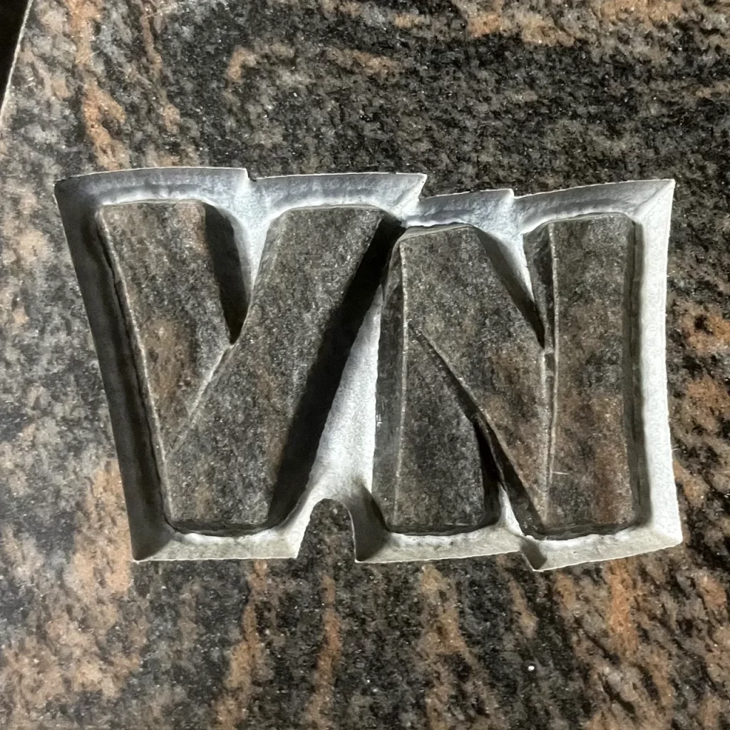 Schriftbearbeitung Ornamentik bearbeitet in unserer Strahlkabine